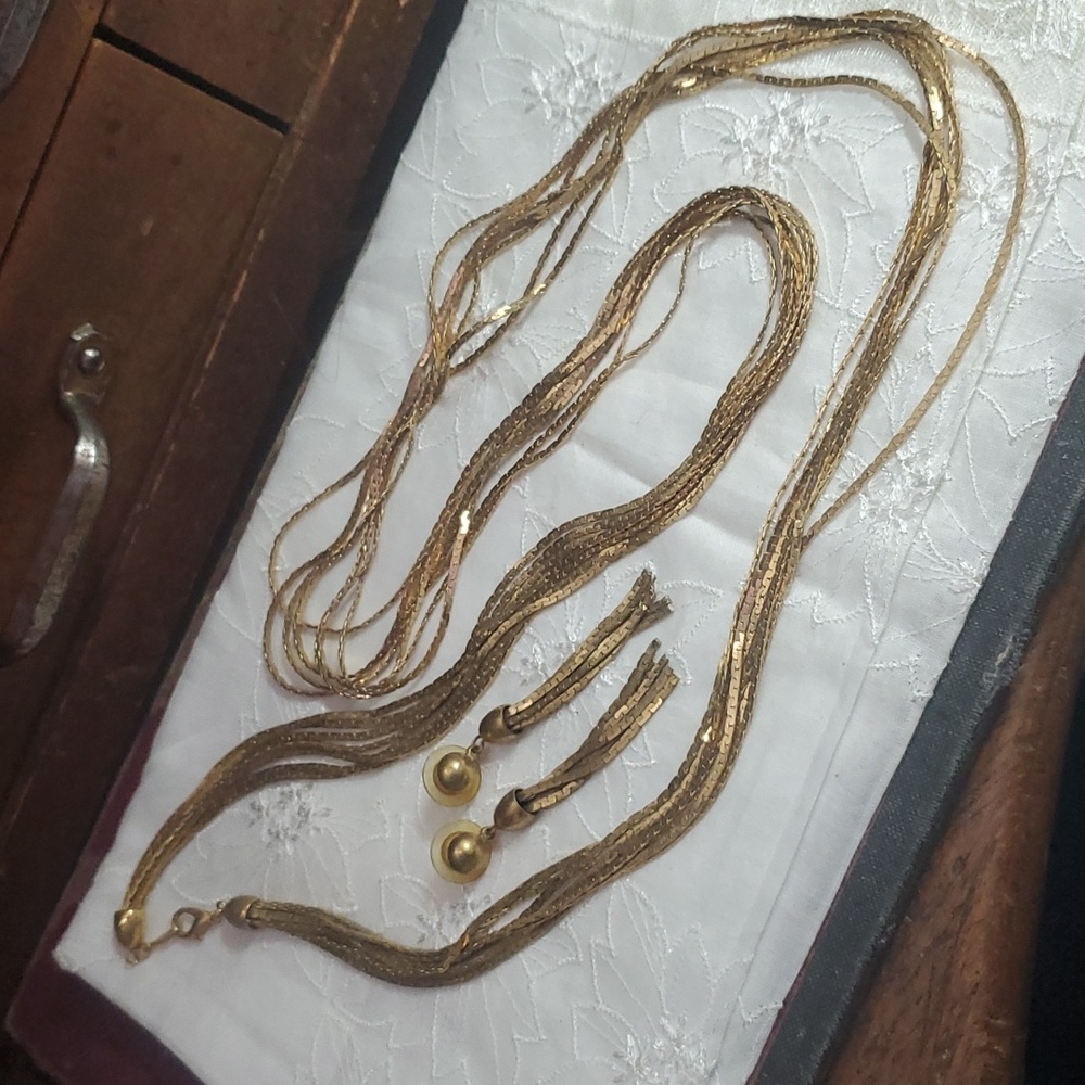 34" 7 strand Goldstone serpentine necklace With Matching earrings Dx